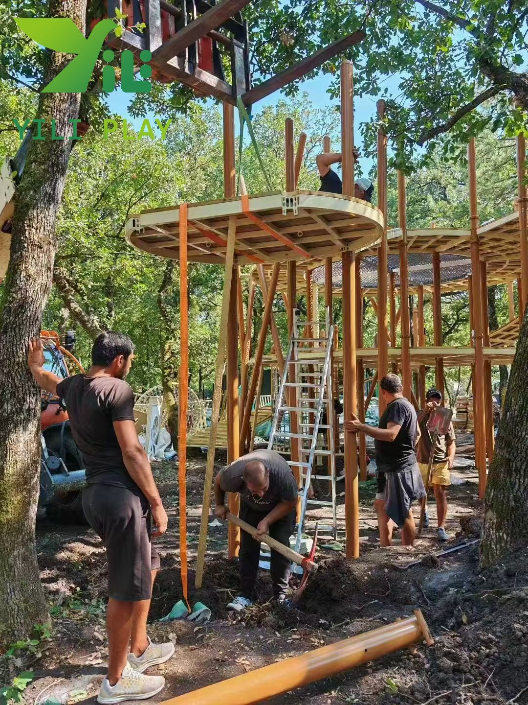 European pinecone outdoor playground with natural wooden cabins, rope bridges, and climbing structures