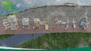 Seaside outdoor playground equipment with castle towers, climbing nets, and spiral tube slides in a cultural tourism park