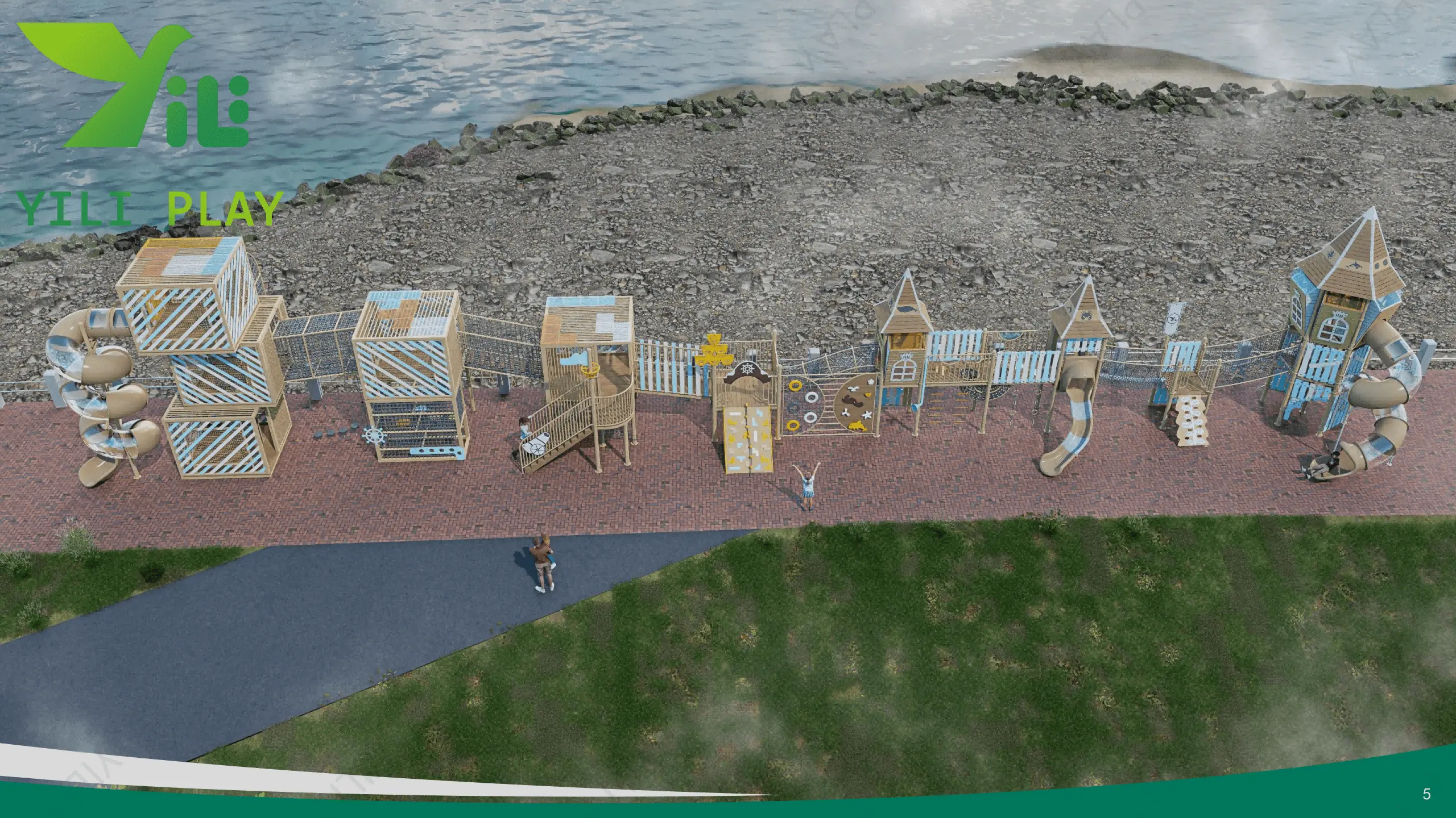 Seaside outdoor playground equipment with castle towers, climbing nets, and spiral tube slides in a cultural tourism park