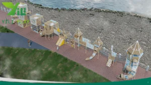 Seaside outdoor playground equipment with castle towers, climbing nets, and spiral tube slides in a cultural tourism park