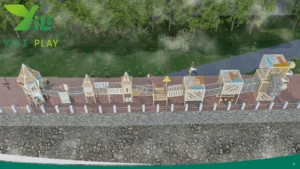 Seaside outdoor playground equipment with castle towers, climbing nets, and spiral tube slides in a cultural tourism park