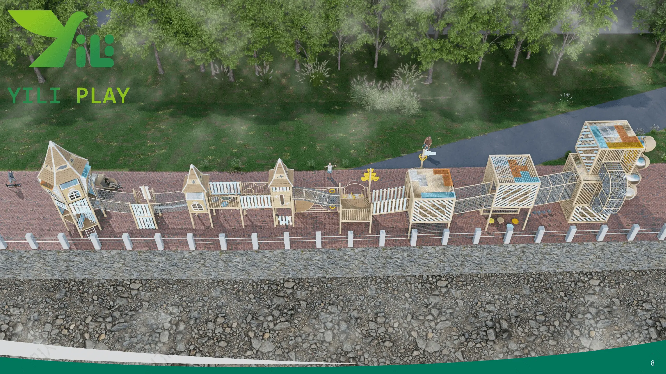 Seaside outdoor playground equipment with castle towers, climbing nets, and spiral tube slides in a cultural tourism park