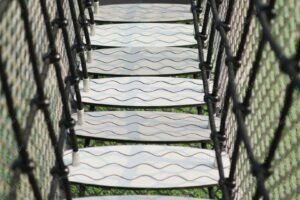 HPL outdoor playground set with aluminum posts, slides, and rope bridges EN1176 certified