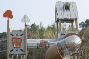 HPL outdoor playground set with aluminum posts, slides, and rope bridges EN1176 certified